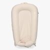 DockATot Deluxe+ Babynest, Sand Chambray
